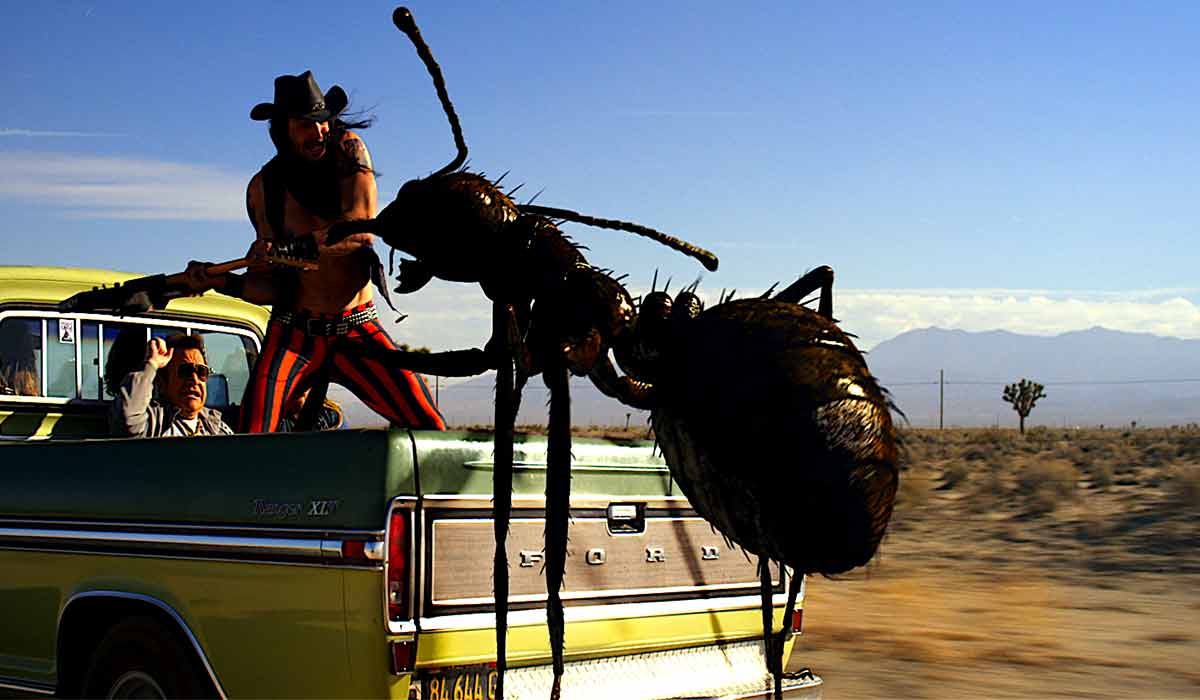 Dead Ant film still giant ant attacking band in pickup truck