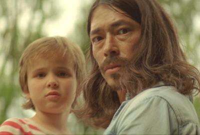 Deliria film still man with his child