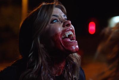 The Hitchhiker film still bloody mouth woman vampire