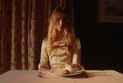 Oedipus film still woman at the table 