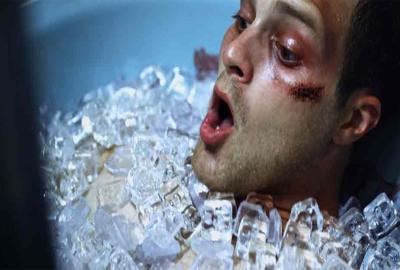 INCUBATOR man immersed in ice