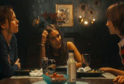 Kindred Spirits film still women sitting at the dinner table.