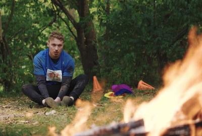  Obstacle Corpse Film still runner looking at a fire obstacle