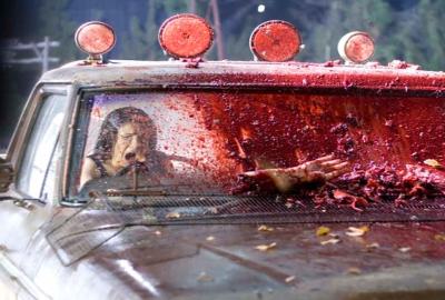 Storm Warning bloody all over the police car windshield