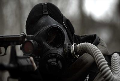 The Rising man in gas mask