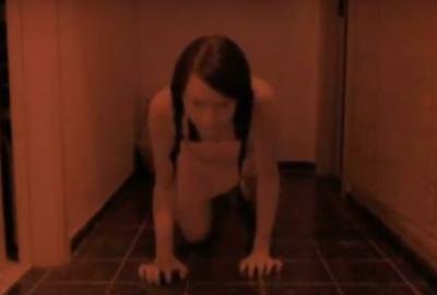 Thermae 2'40" woman crawls down a dark hall