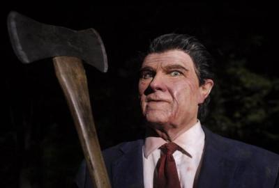 The Tripper Ronald Reagan masked man with an axe