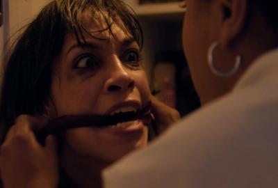 Rosario Dawson gagged